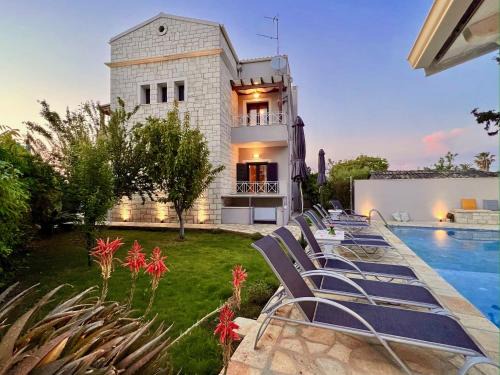 Acharavi Villa | Beach Villa Heart House with private pool by DadoVillas
