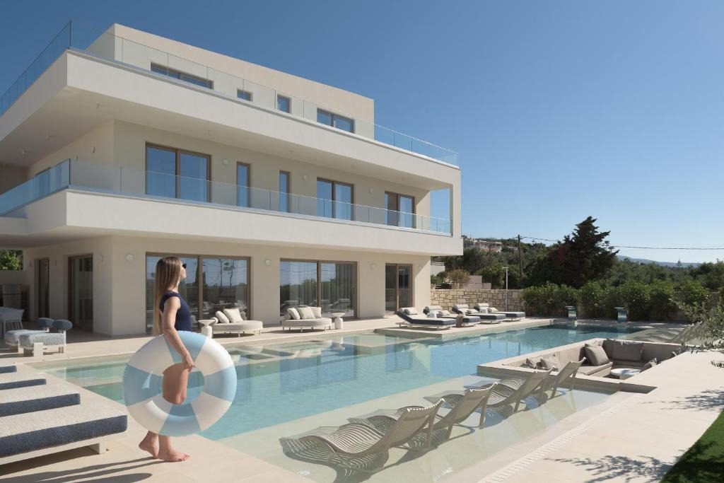 Pigianos Kampos Villa | Calòre Villas, Close to Beach, Gym, Wellness & Cinema, By ThinkVilla