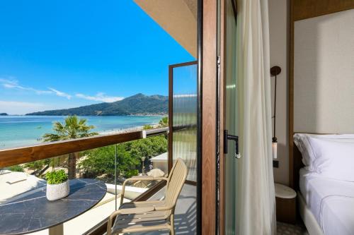 Chrisi Ammoudia Hotel | Enavlion Elegance Seaside Luxury