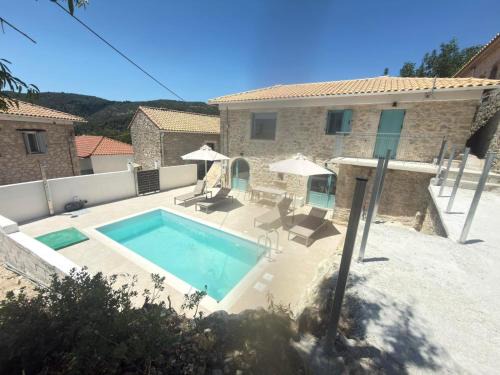 Kavallos Villa | Light Blue Stonehouse