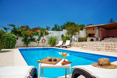 Livadi Villa | Luxury Seaside Villa Plumeria ,50m to Sandy Beach, Chania