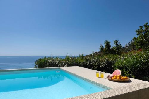 Steniai Villa | Luxury villa by the beach by Andros Villas Collection