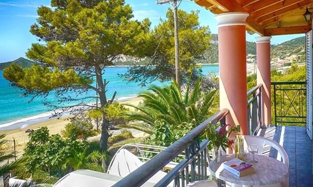 Agios Georgios Pagon Apartment | Maria's apartment 1 - right on the beach with sea views in the beautiful bay of Agios Georgios Pago