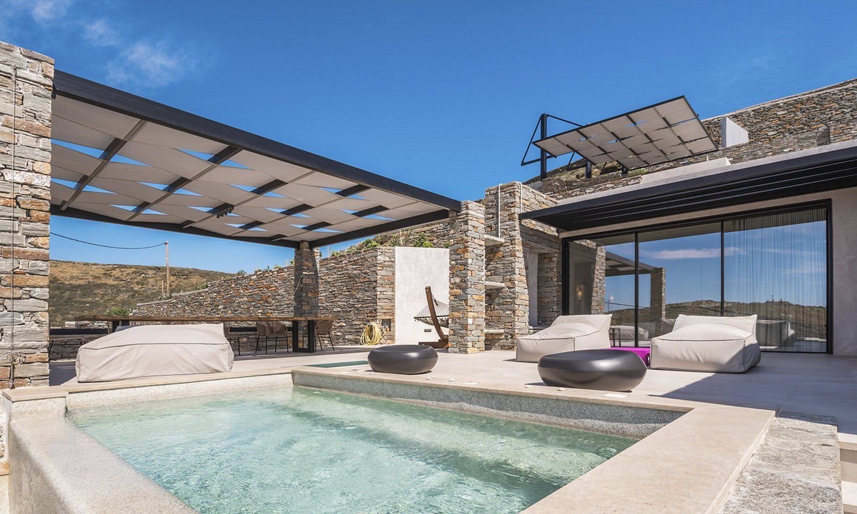 Vourkari Villa | My Rental Homes - Villa Kronos with lounge area and a heated Jacuzzi-plunge pool.