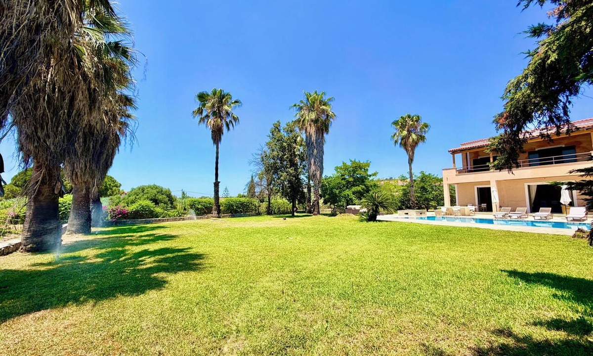 Svoronata House | Palm Villa Ammes | Luxury Estate Pool Tennis Court Steps from Ammes Beach