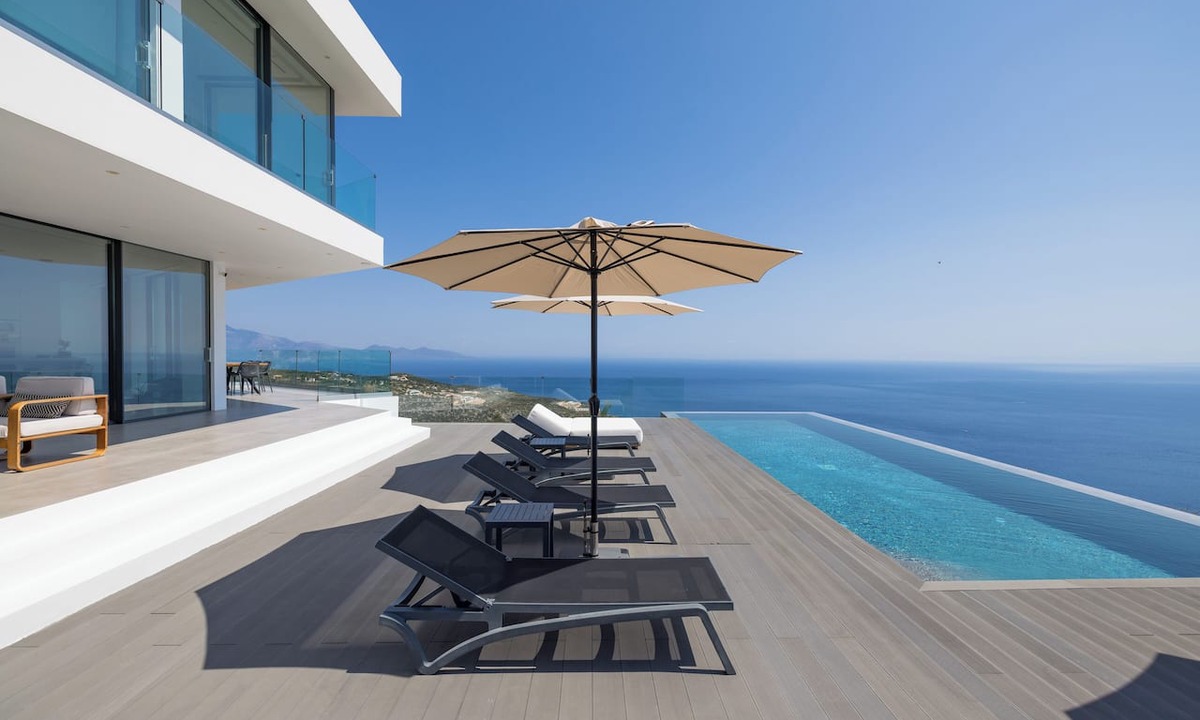 Korithi House | The Luminous Villa: private estate, 4 sea-view suites, heated pool, sleeps 8