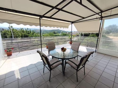 Fournes Apartment | Veranda with Endless View among Orange Trees