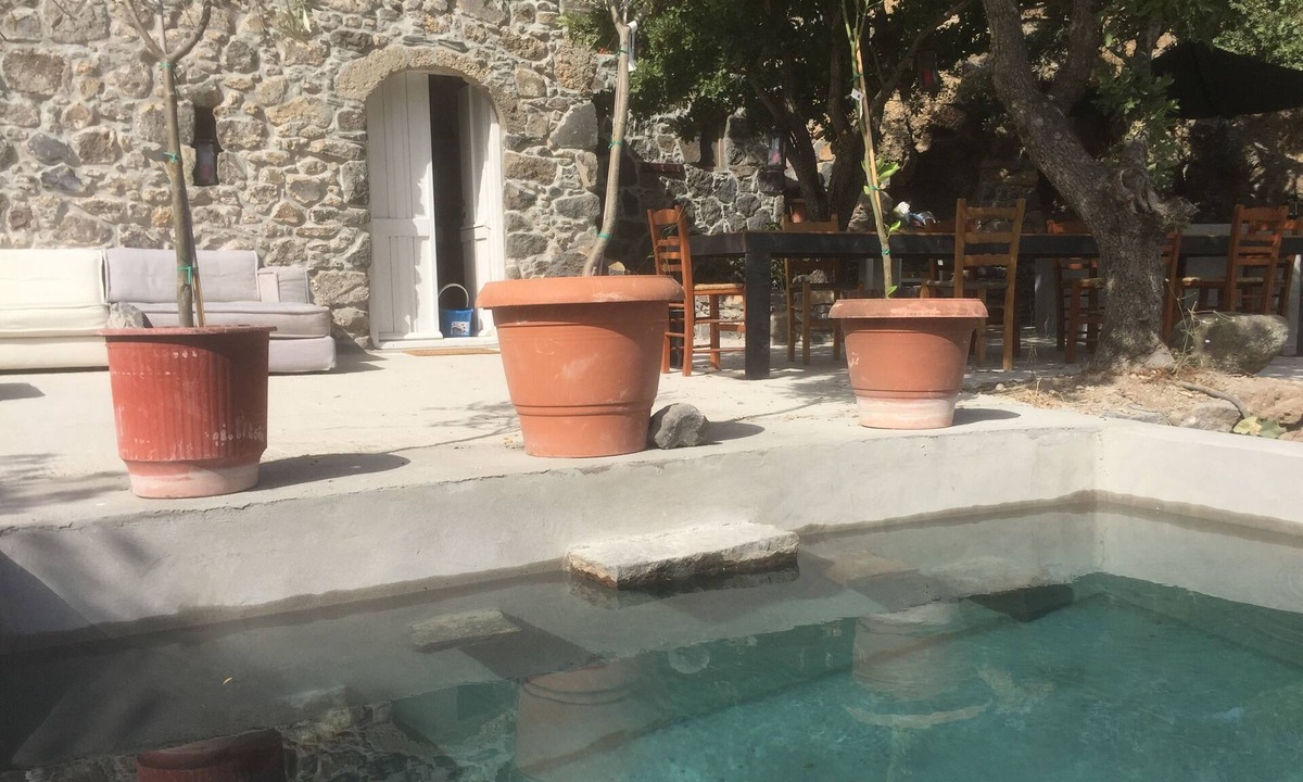 Mandraki House | villasglamp. Old Stone House in 2 000 sqm garden. Plunge pool. Sea Views.