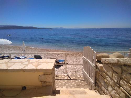 Katavolos Villa | Yellow House Lower,Beachfront, Nissaki, Kaminaki beach