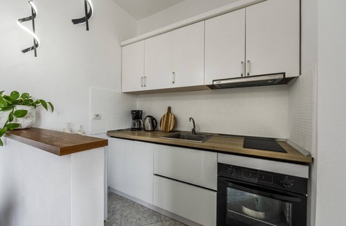 Golem Apartment | 1BR Apartment with Tree Views | Golem by PikHost