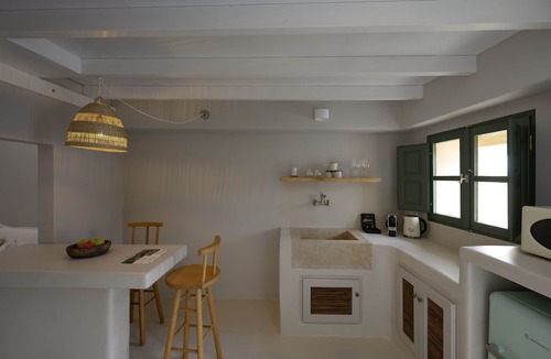 Megalochori Hotel | 2 bedroom Family Cave Suite, terrace & kitchen, by Elements Suites