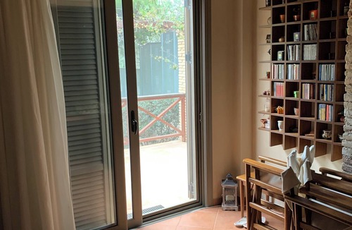 Agii Anargiri Cottage | A cheerful cottage with a beautiful garden near the sea.