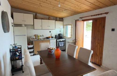 Aegina House | A stone retreat 40m from the sea, in a private 1,200m² estate on Aegina island.