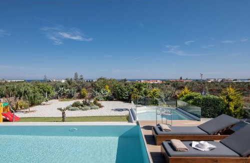 Agkisaras Villa | Alba Bianca Villa, Family Retreat with Heated Pool By ThinkVilla