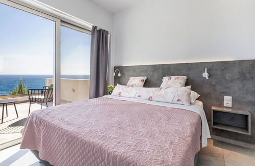 Pefki Villa | Anatoli (Sunrise), an exquisite seaside villa, with the vibrant hues of sunrise.