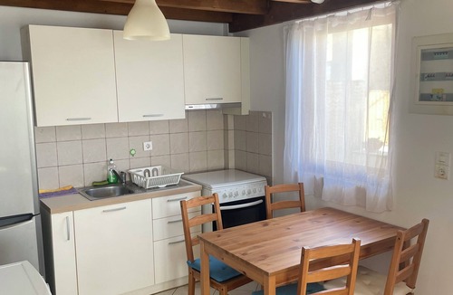 Amarinthos Apartment | Beach House in Amarynthos with Direct Sea Access