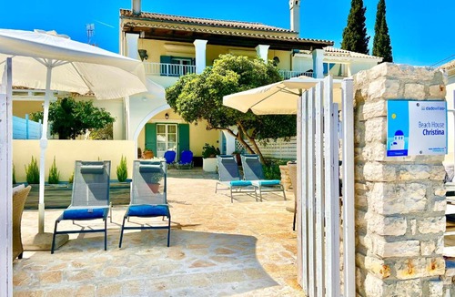 Kassiopi Villa | Beachfront House Christina with private heatable pool by DadoVillas