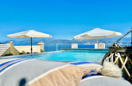 Kassiopi Villa | Beachfront House Christina with private heatable pool by DadoVillas