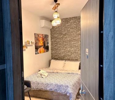 Edessa Apartment | Central & Riverfront Room 1