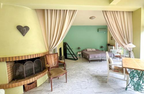 Argyroupoli Apartment | Charming Sunlit Apartment with Garden Views