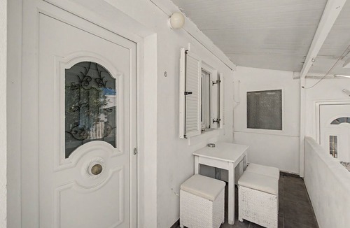 Perissa Apartment | Economy Quadruple Room 5 with Mountain View, Balcony, and Air Conditioning