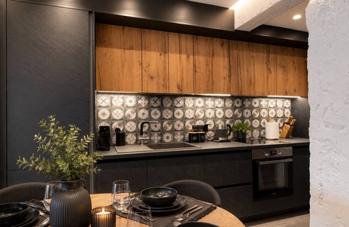 Koukaki Villa | Gold & Concrete Acropolis Residence