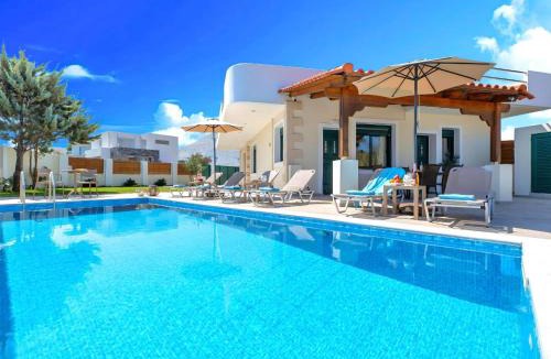 Paralia Kourna House | Holiday Home Eliomar Villa am Strand by Interhome