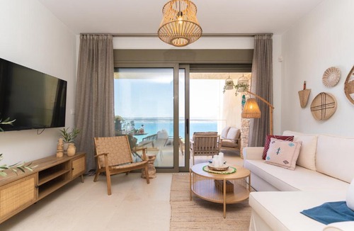Kalyves Apartment | Kymvari - Stunning sea view-elegant apt-infinity shared pool