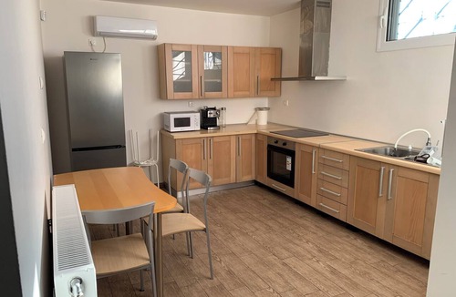 Saronikos Apartment | Lovely very bright semibasement apartment with 2 bedrooms, double and tween