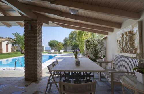 Kalyvia Thorikou Villa | Luxury 4 Bdrm Villa with Pvt Pool on the beach