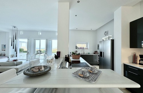 Kostos Villa | Luxury villa with pool in the middle of an olive grove and dream view of the sea