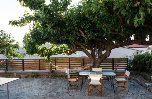 Psathoyiannos Cottage | Maro's village hall. Private & Serene Stone Villa