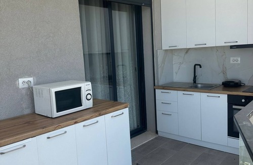 Radhime Apartment | Modern seaview apartment just 5 min from restaurants and markets, free parking!”