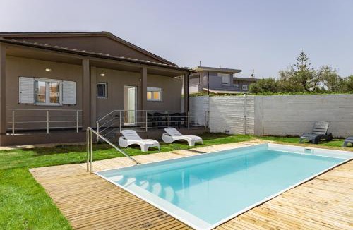 Tavronitis Villa | NeSo - Villa Fyllo with Pool steps from the Beach