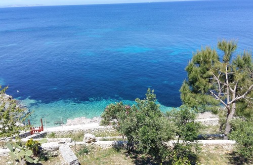 Gaios Villa | Paxos Sunrise Villa ,birds eye view, access to a small secluded beach