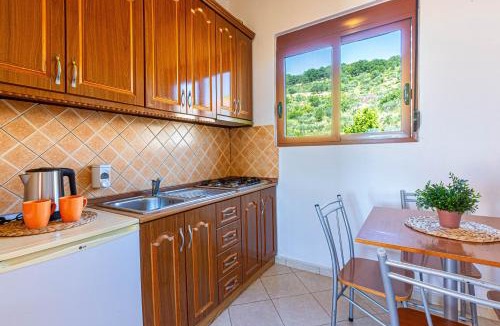 Radhime Apartment | Radhima Sea View Studio Apt 2 - Kitchen, Parking & Balcony