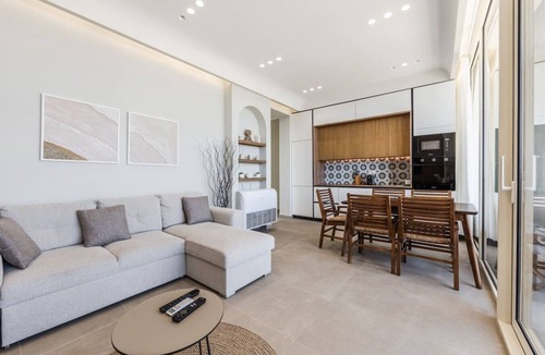 Jala Apartment | Sea View Panorama | Green Coast 2BR Patio Retreat by PikHost