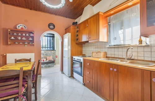 Nea Kydonia House | Stone house among trees with private garden, terrace & Wi-Fi