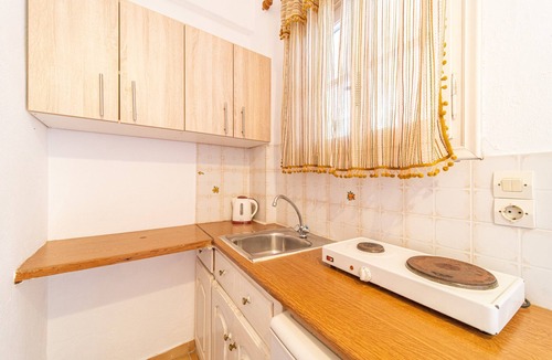 Paleokastritsa Apartment | Studio "Arianna Studio Ground Floor 1" with Sea View, Shared Pool & Wi-Fi