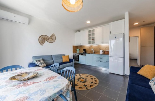 Sakës Apartment | Talea Sun & Sea Haven 1BR Apartment by PikHost