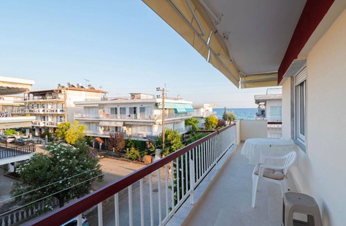 Paralia Dionysiou Apartment | Thanos and Sofia by RentalsPro