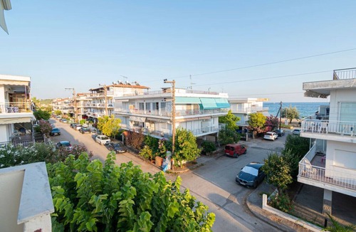 Paralia Dionysiou Apartment | Thanos and Sofia by RentalsPro