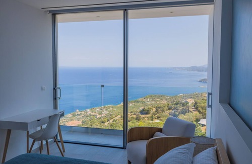 Korithi House | The Luminous Villa: private estate, 4 sea-view suites, heated pool, sleeps 8
