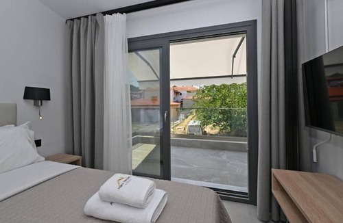 Agios Nikolaos Apartment | Traditional stay in Agios Nikolaos,near Sithonia's most beautiful beaches