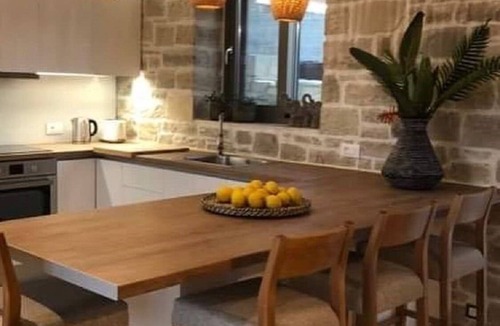 Sivas Villa | Triades Villas 1, a dream home built of natural stone with a saltwater pool, set in a peaceful setting