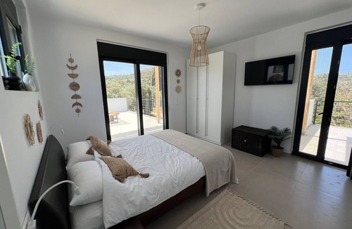 Kamilari House | Villa M with a great pool and a beautiful view of the sea and mountains.