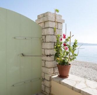 Katavolos Villa | Yellow House Lower,Beachfront, Nissaki, Kaminaki beach