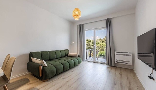 Aqua Breeze Golem | 1BR Apartment by PikHost