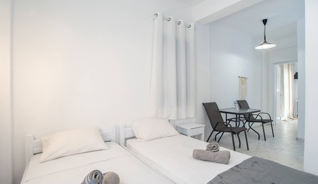 Economy Quadruple Room 1 with Balcony and Air Conditioning