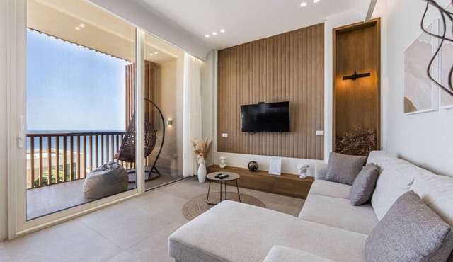 Sea View Panorama | Green Coast 2BR Patio Retreat by PikHost